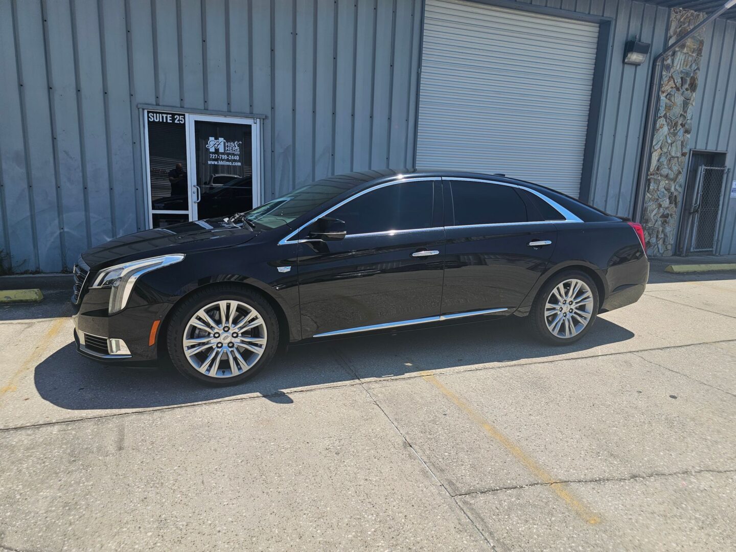 Luxury car in sunny parking lot