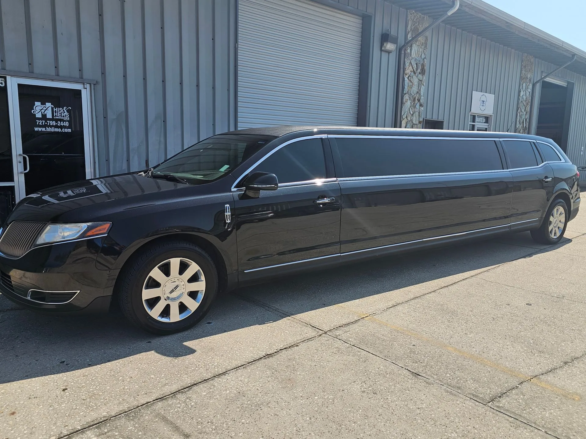 Long luxury limo in sunlight
