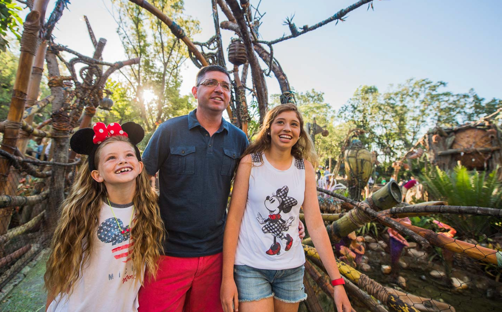 Happy family exploring outdoor attraction