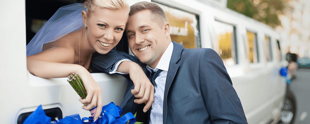 Happy couple posing on wedding day